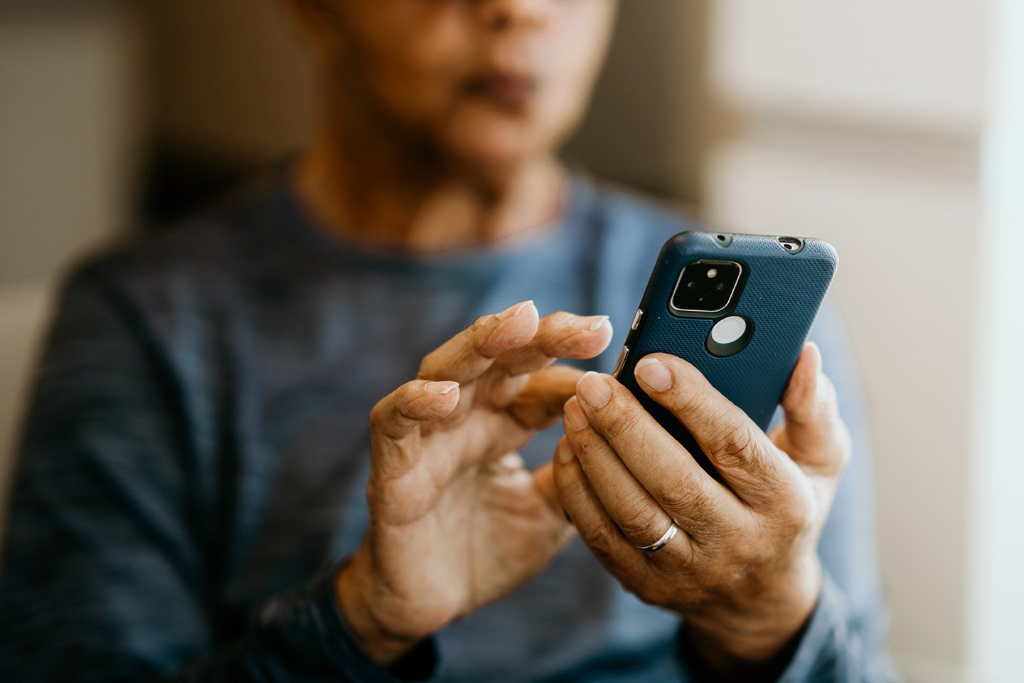 Member scrolling on phone
